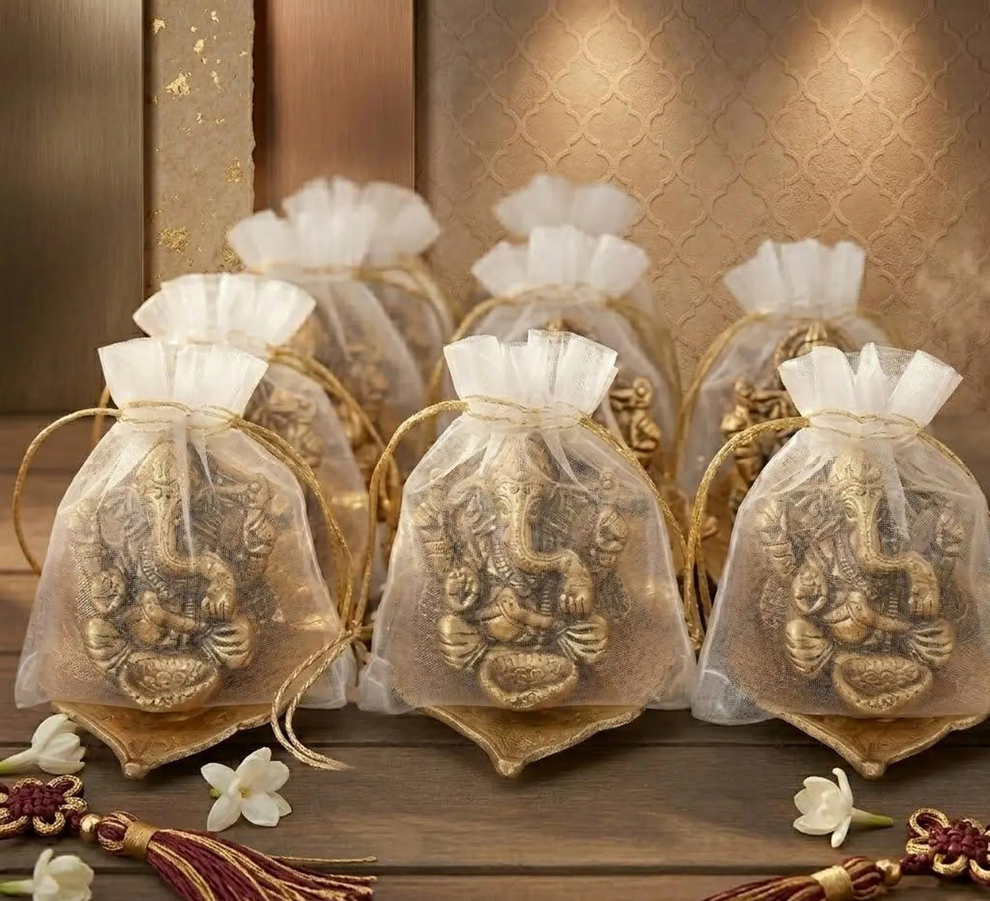 Handcrafted Gold Ganesha on Leaf Stand with Organza Pouch For Return Gifts