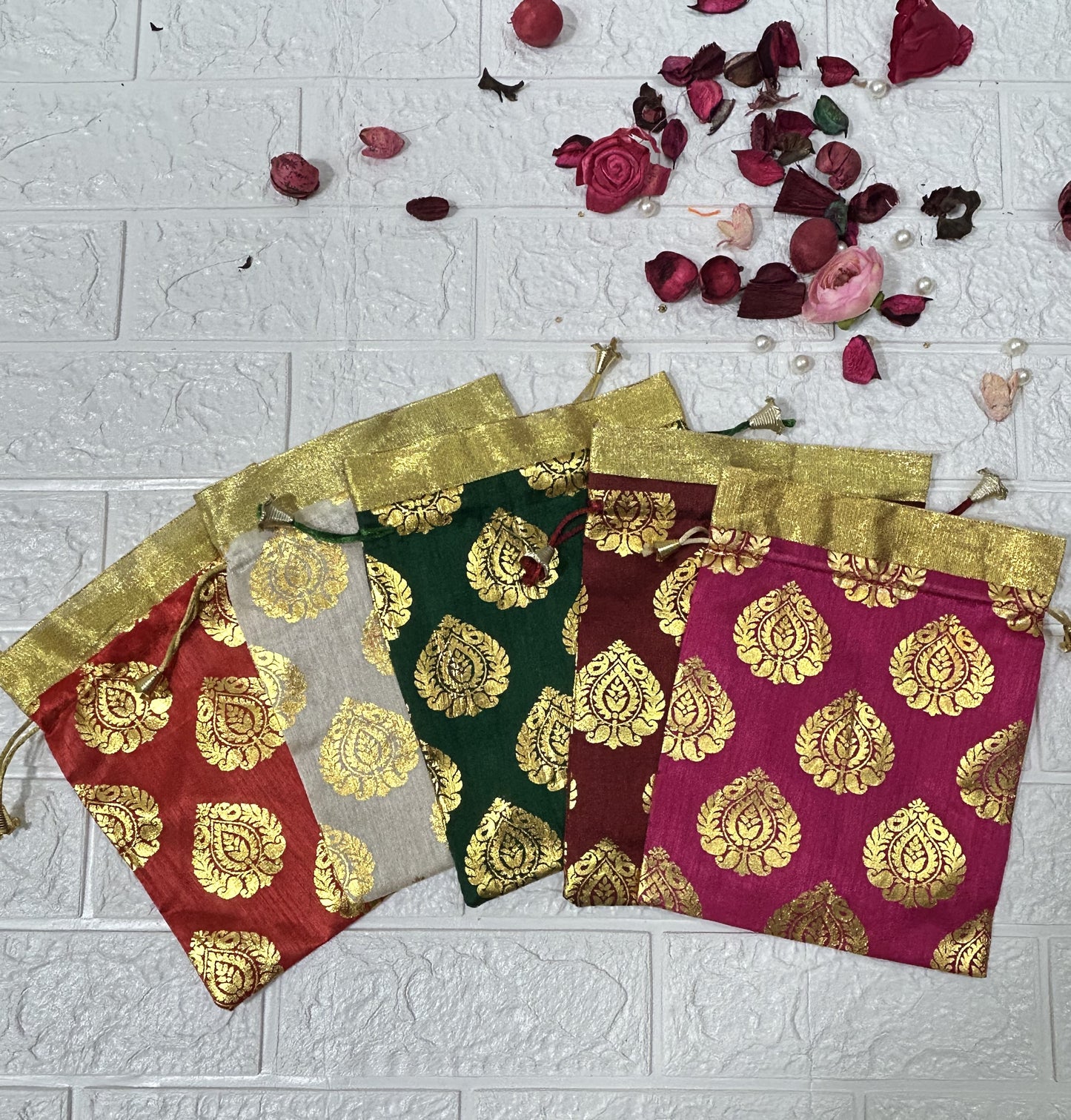 DesiTohfa colorful Gift Packing Potli Bags with golden floral patterns and drawstring closure
