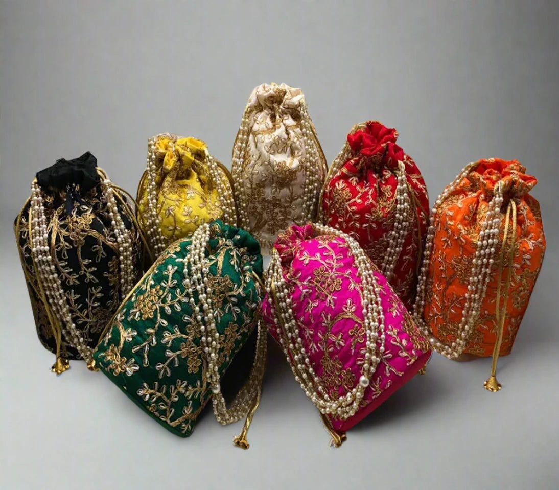 Desi Tohfa round embroidered potli bags in multiple colors with gold floral embroidery and drawstring closure