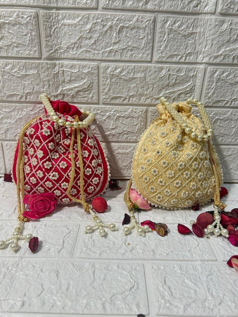 DesiTohfa pearl work potli bags for bridesmaid gifts in red and beige with intricate bead detailing