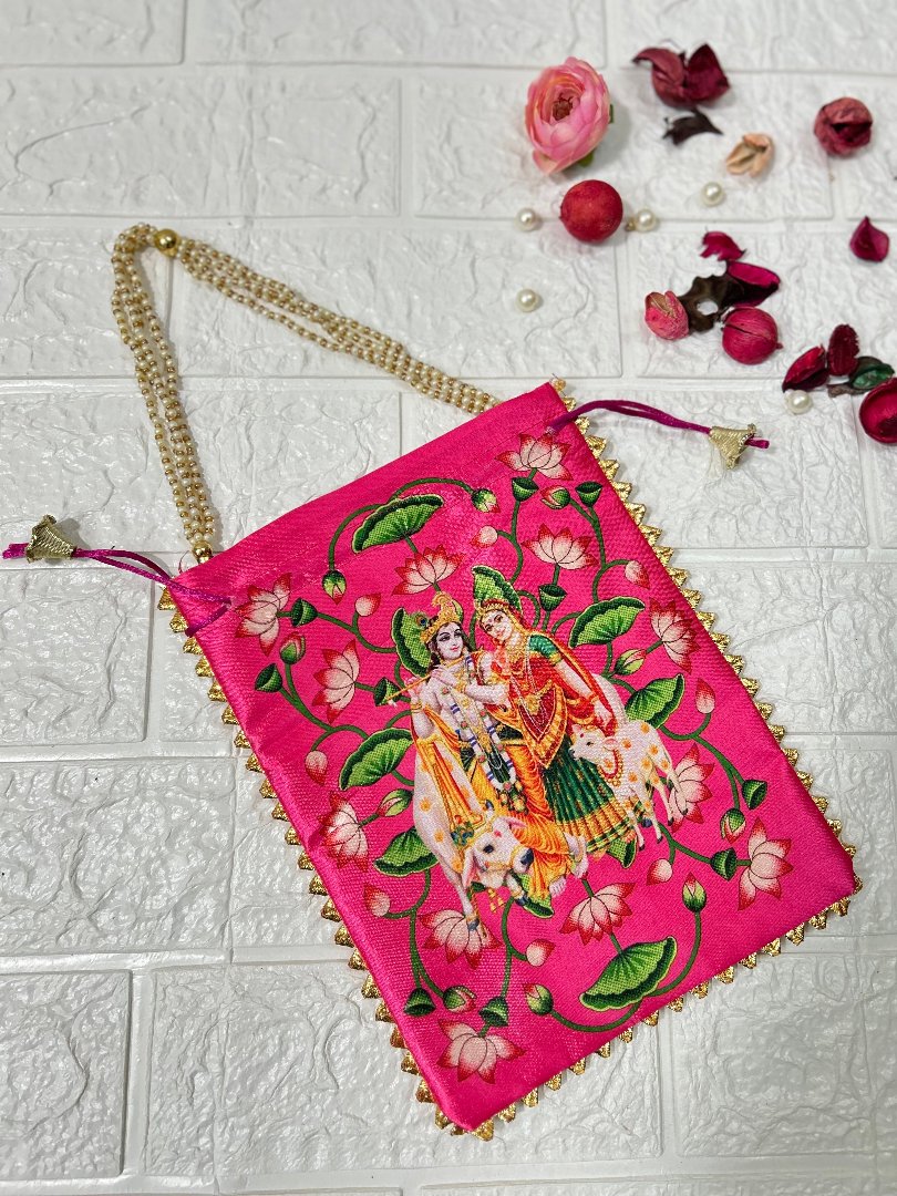 DesiTohfa pink potli bag with traditional Radha Krishna embroidery and golden chain handle