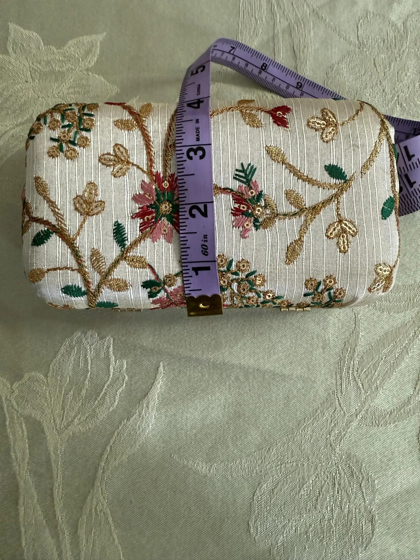 Elegant beige clutch Ideal for wedding favors, bridesmaid gifts & women’s return gifts.