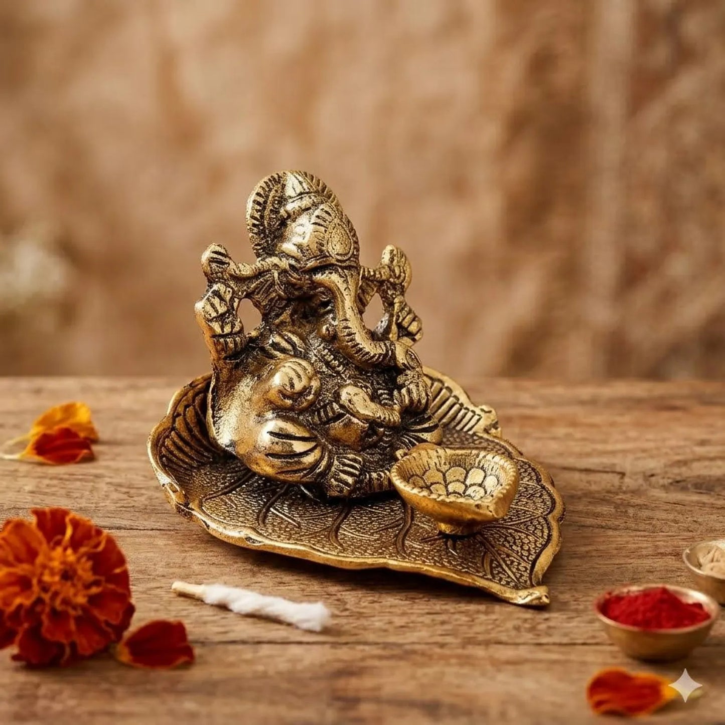 Handcrafted Gold Ganesha on Leaf Stand with Organza Pouch For Return Gifts