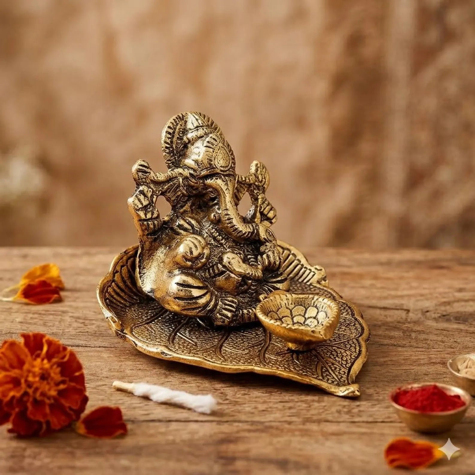 Handcrafted Gold Ganesha on Leaf Stand with Organza Pouch For Return Gifts