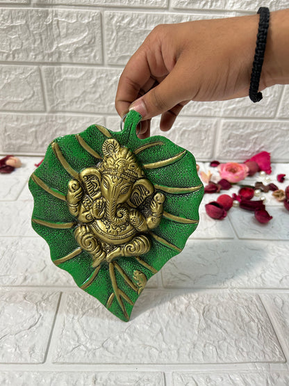 Lord Ganesha Idol On Leaf For Return Gifts