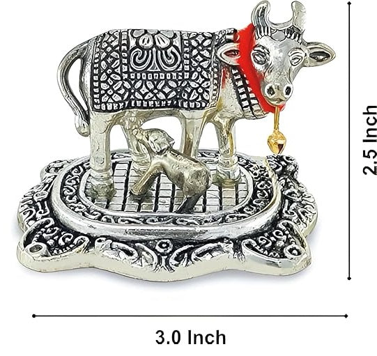 Decorative metal sculpture of a cow and calf with dimensions on a white background
