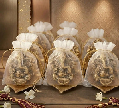 Handcrafted Gold Ganesha on Leaf Stand with Organza Pouch For Return Gifts