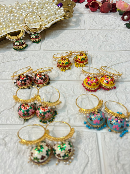DesiTohfa Meenakari Jhumka earrings in various colors with intricate floral designs and gold detailing