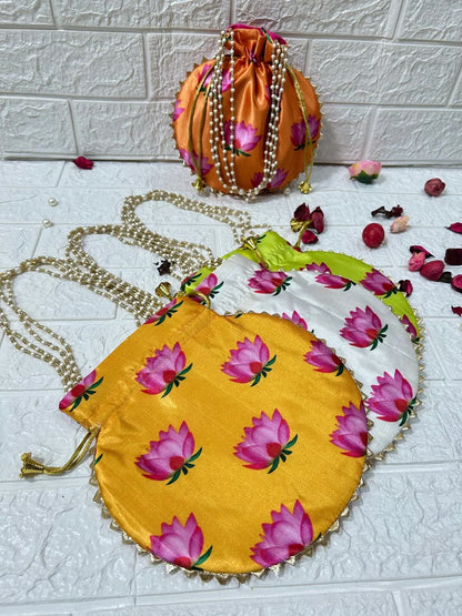 DesiTohfa Potli Bags in orange satin with pink floral design and pearl chain handles