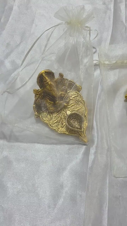 Handcrafted Gold Ganesha on Leaf Stand with Organza Pouch For Return Gifts