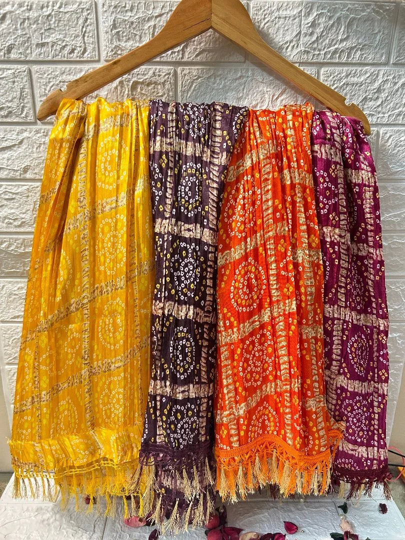 Colorful Bandhani Dupatta set from DesiTohfa featuring yellow, purple, orange, and magenta designs with traditional patterns