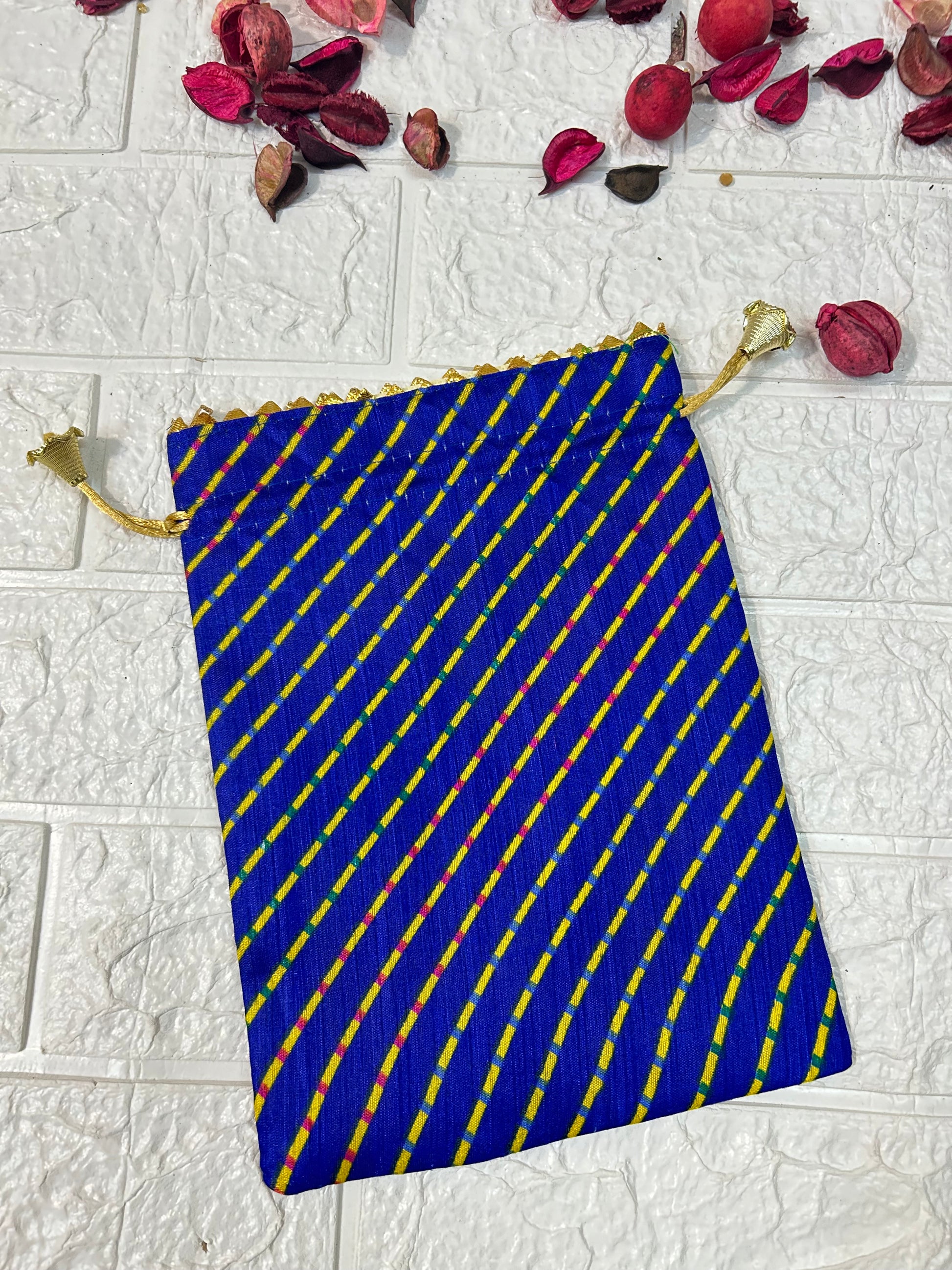 DesiTohfa multicolor leheriya gift bags in blue with yellow and red diagonal stripes and golden drawstrings