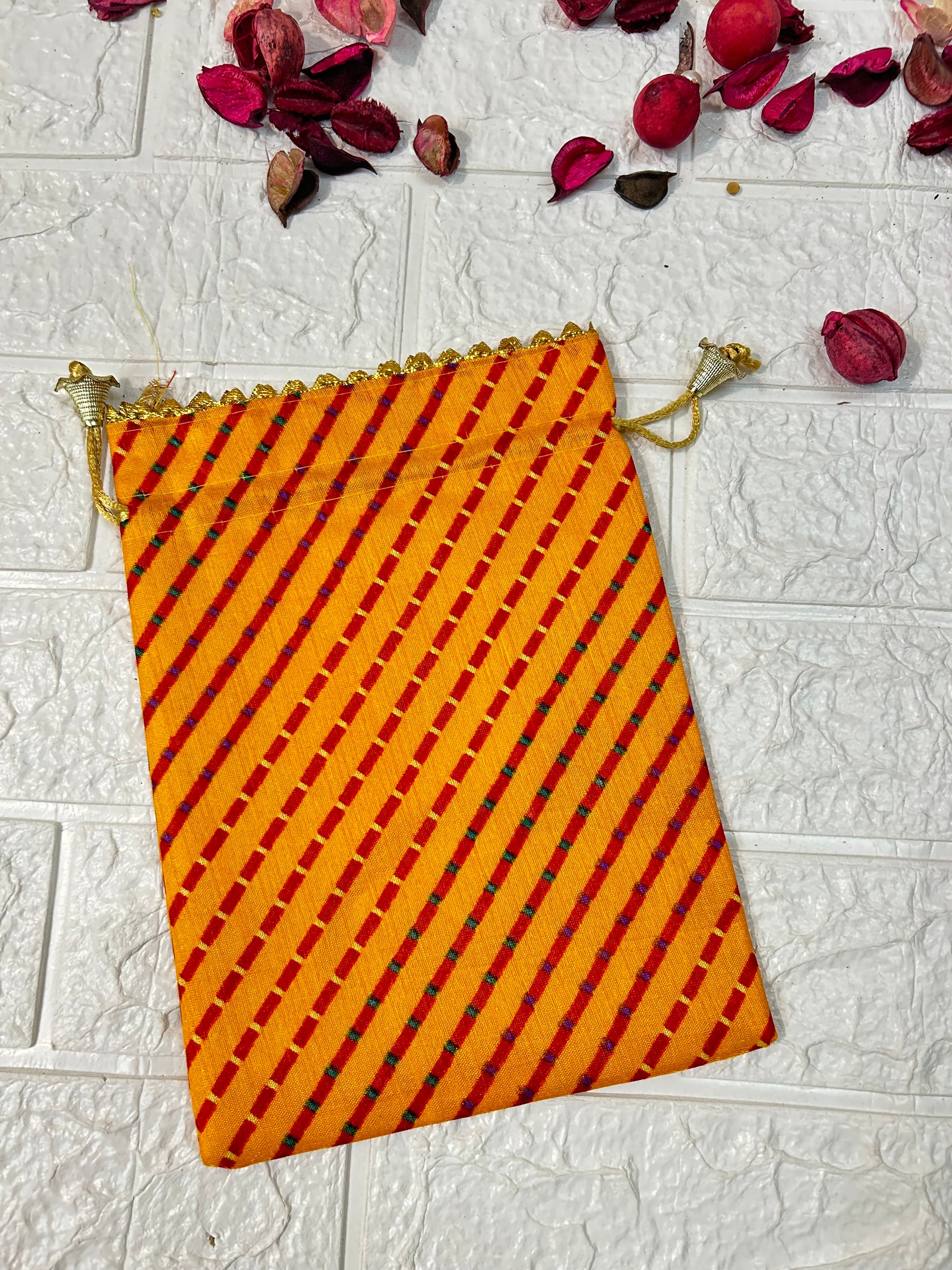 DesiTohfa multicolor leheriya gift bags potli bag with orange and red striped pattern drawstring closure